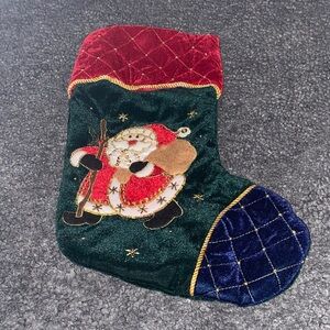 Velvety embellished stitched Santa Christmas stocking.